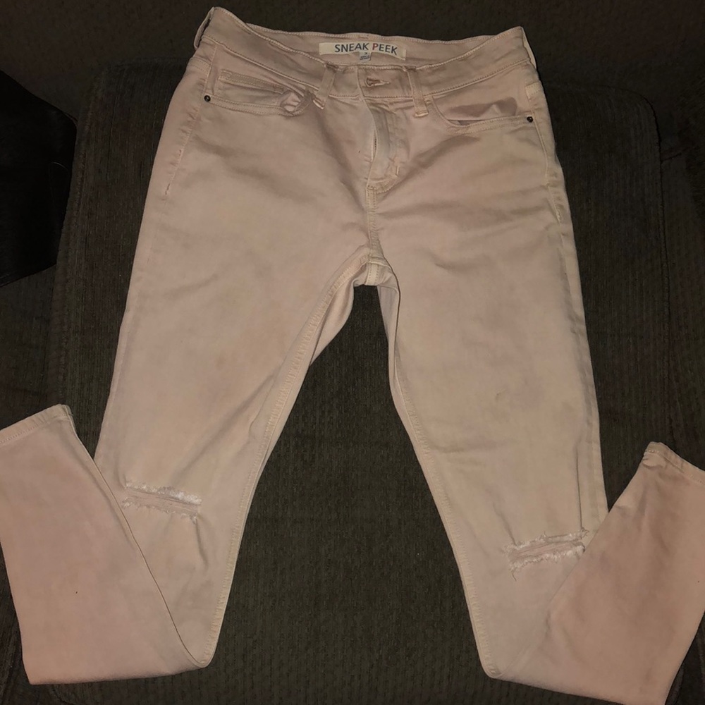 Light pink ripped jeans